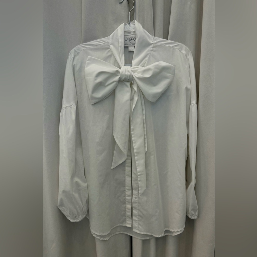 Anthropologie white long sleeve top with big Bow tie